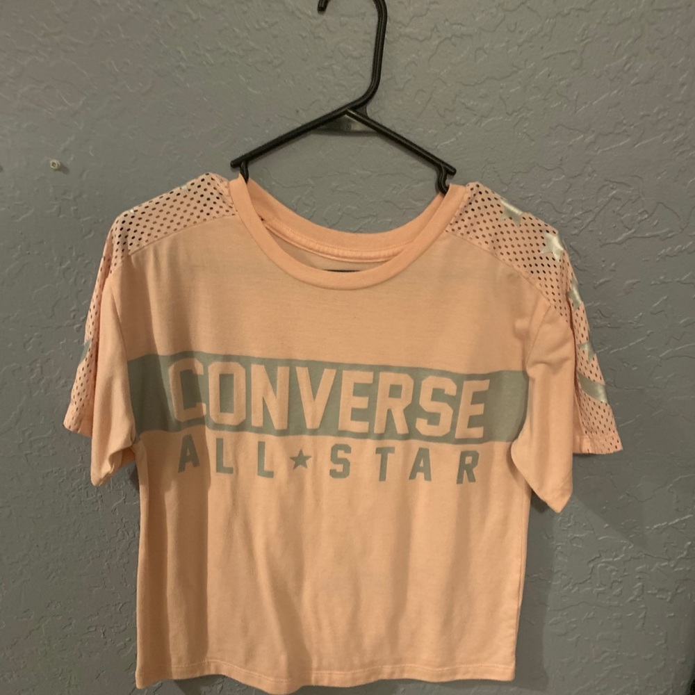 A pink converse mid croptop
